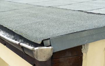 repair or replace Abbey Village flat roofing?